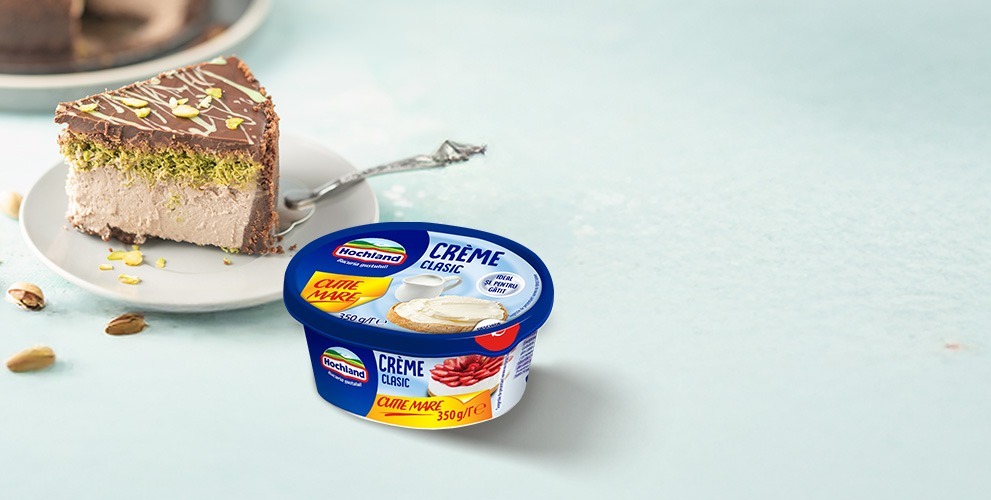 https://hochland.ro/wp-content/uploads/2025/10/Cheesecake-STOCK-_991x500-2.jpg